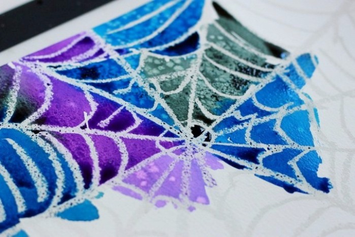Crayon relief painting of a spiderweb