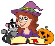 Cat and witch reading.