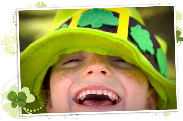 Smiling child with a St. Patrick's Day hat