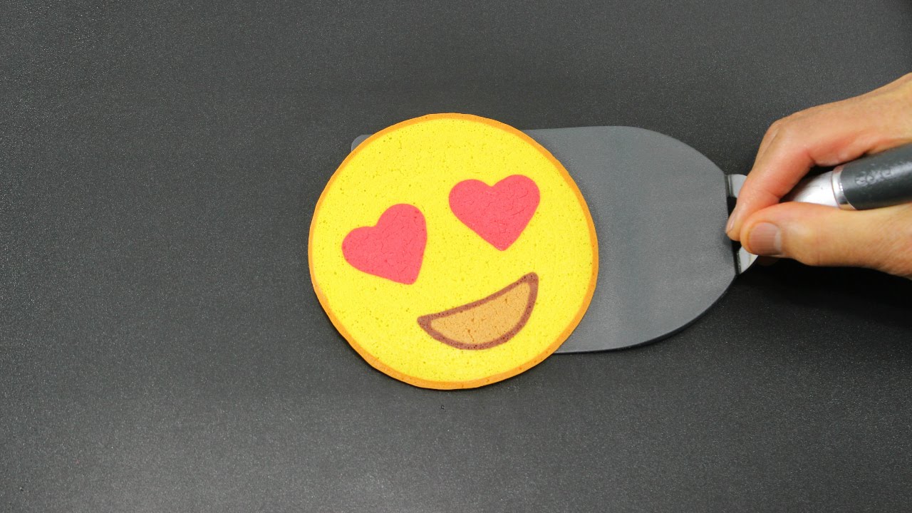 A pancake that looks like an emoji with heart-shaped eyes.