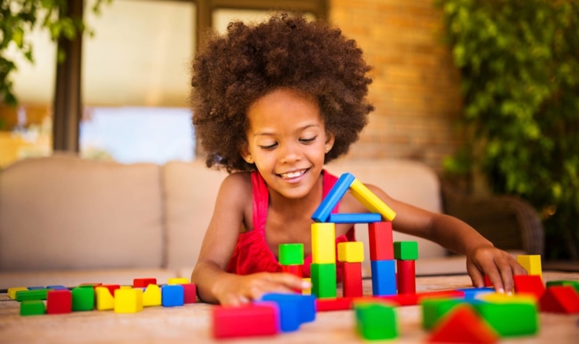 Child building with blocks.