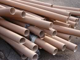A large pile of cardboard tubes.