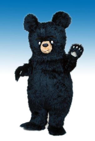 Person in a black bear costume.