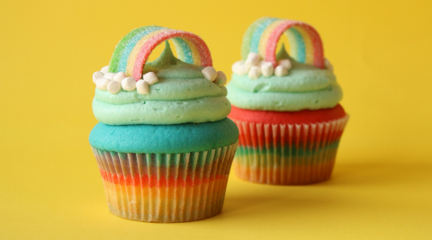 Two rainbow cupcakes