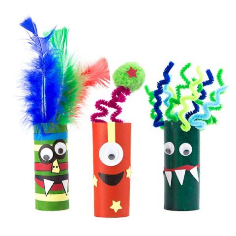 Cardboard tubes with eyes, teeth and hair