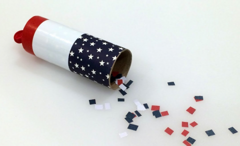 Toilet paper tube and confetti.