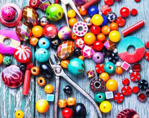 a lot of beads and a few jewery making tools