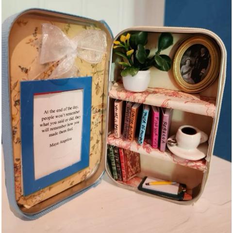 Bookshelf made in an Altoids tin.