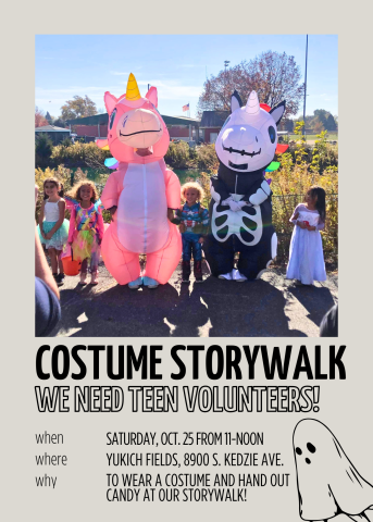 Teens in inflatable unicorn costumes surrounded by younger children.