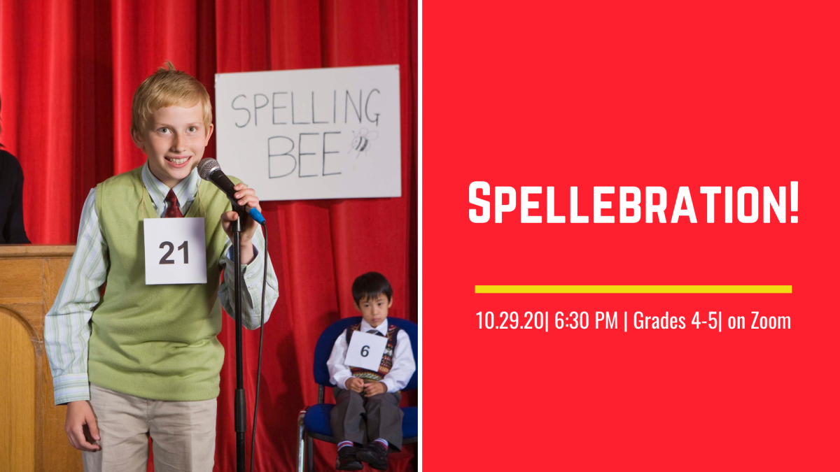 A boy smiling in front of a microphone at a spelling bee.