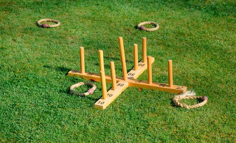 A wooden ring toss.